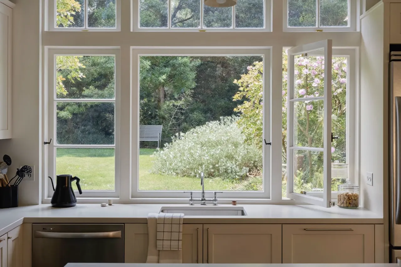 Casement windows seen from inside a bright kitchen