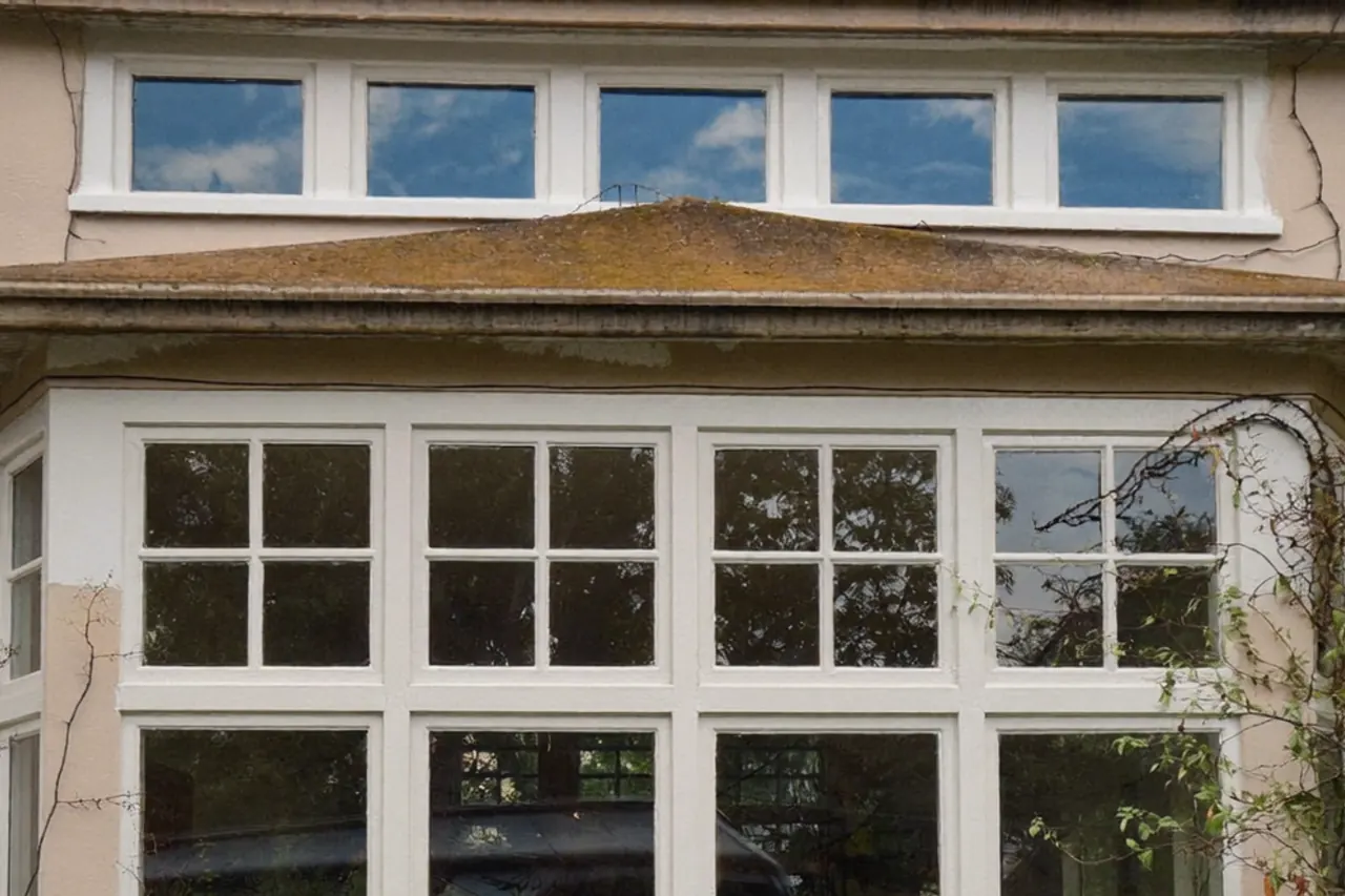 Georgian bar detail on a white casement window